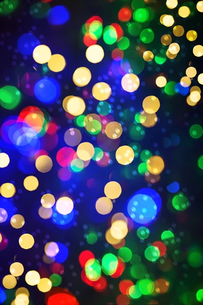 Luces desenfocadas decoraciones navideñas. Fondo brillante abstracto — Foto de Stock