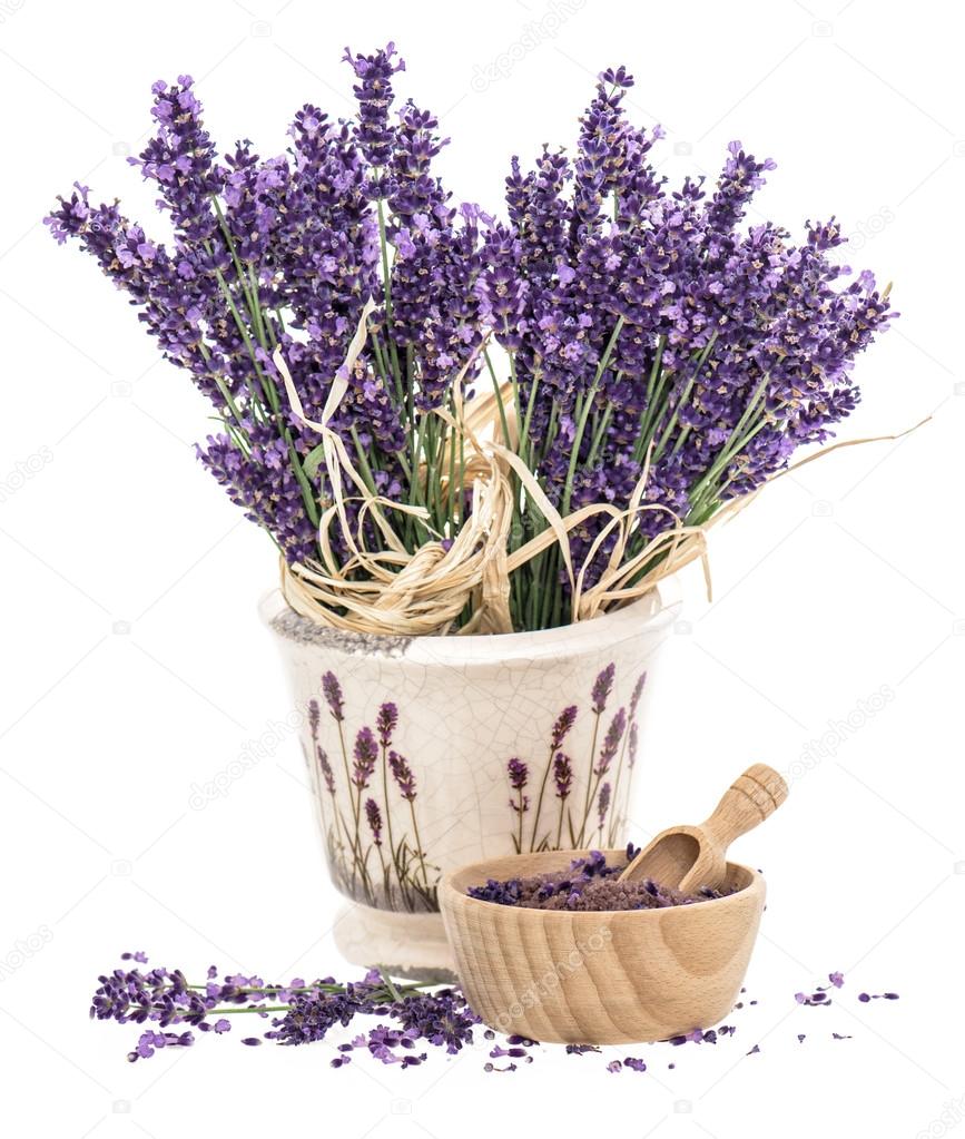 Lavender flowers and wooden mortar with bath salt