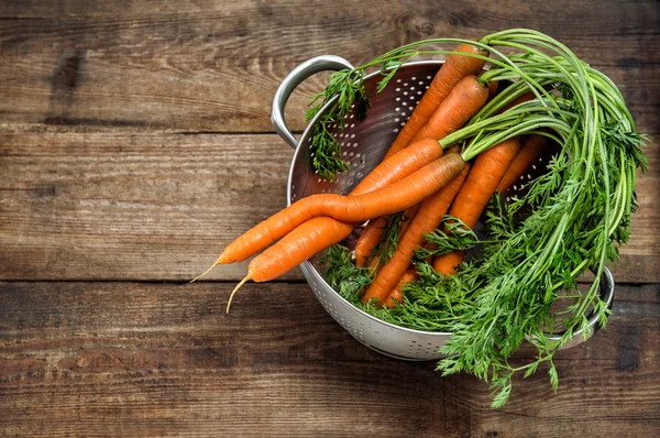 Carrots on wooden background. Vegetable. Food. Vintage style — Stock fotografie