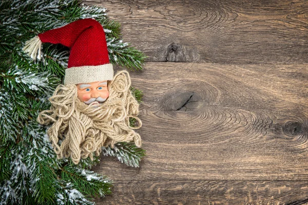 Santa Claus christmas decoration with pine tree branch — Stock Photo, Image