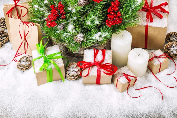 Christmas decoration with pine branches and gift boxes — Stock Fotó