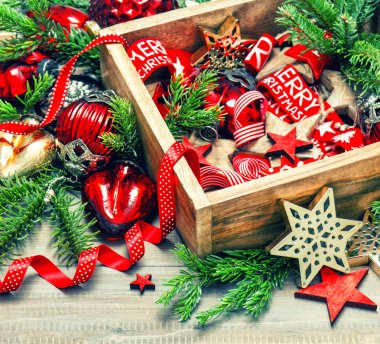 Christmas decorations, toys and ornaments. Red stars, baubles, r