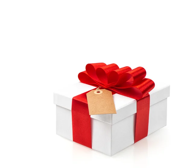 Gift box with red ribbon bow decoration on white background — Stock Photo, Image