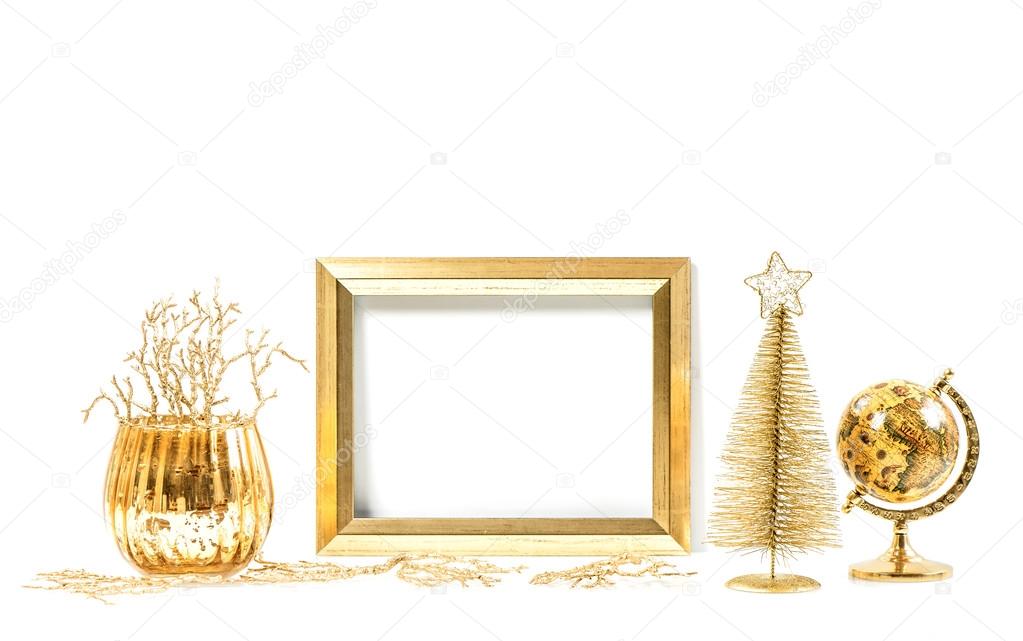 Golden frame and Christmas ornaments. Mock up for picture