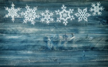 Snowflakes border wooden background clipart