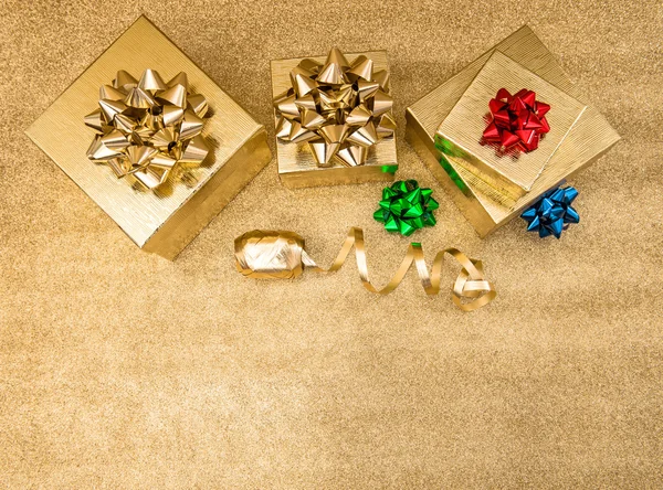 Gift boxes with ribbon bows — Stock Photo, Image