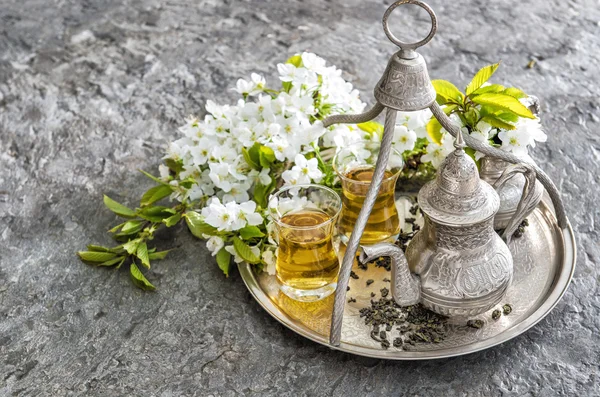 Tea glasses pot. Oriental table decoration flowers — Stock Photo, Image