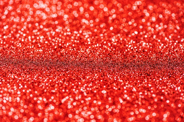 Glitter en gloeien. Glanzende rode achtergrond. Abstracte textuur — Stockfoto