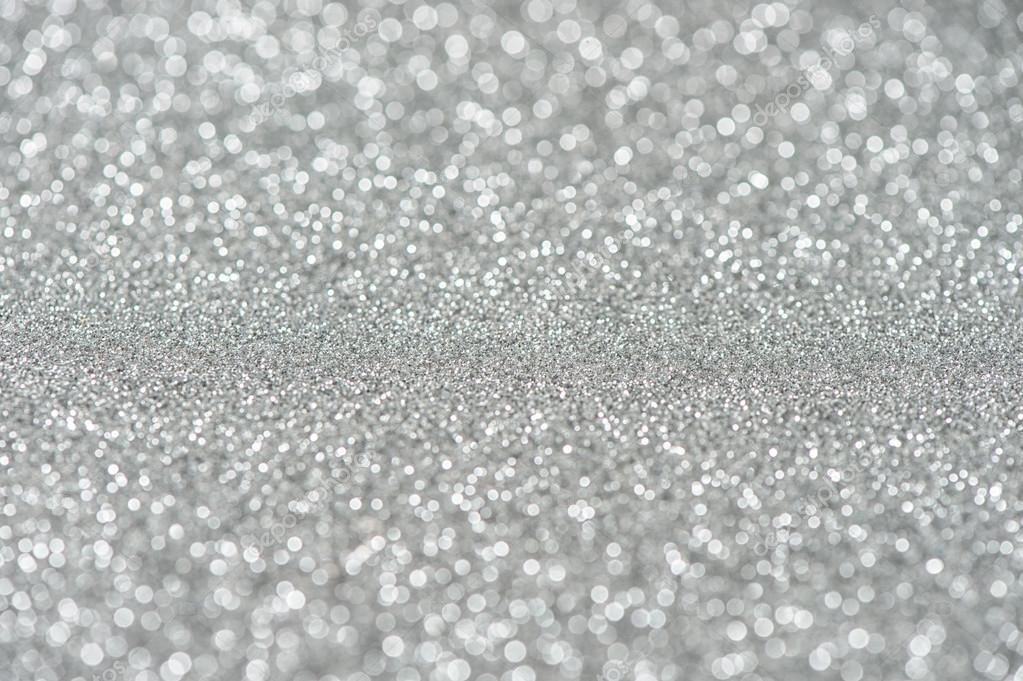 Glitter and glow. Shiny silver background. Abstract texture Stock Photo