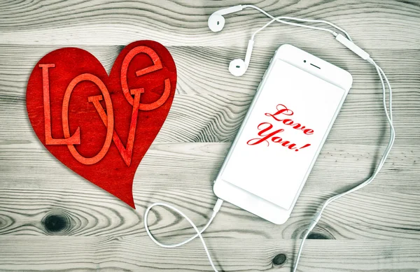 Digital phone with red heart. Love and Valentines Day — Stock Photo, Image