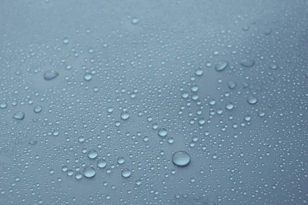 Gri arkaplan dokusuna su damlaları