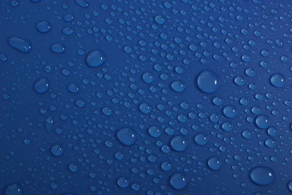 Krople Wody Niebieskim Tle Tekstury — Zdjęcie stockowe