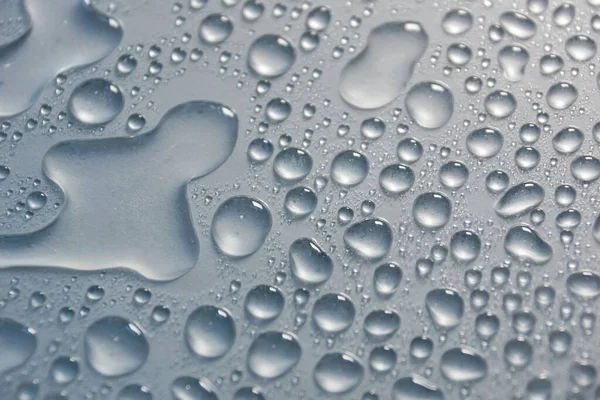 water drops gray color texture background close-up. for design 3D texturing the background with a slideshow or video.