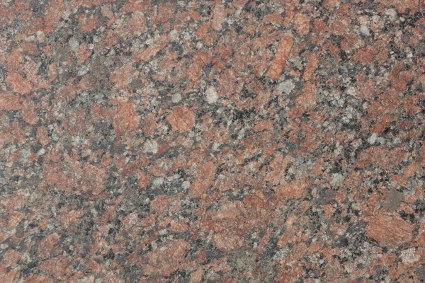 Taş granit kaplama arka plan kırmızı kahverengi. Malzeme tasarımı. Soyut mimari.