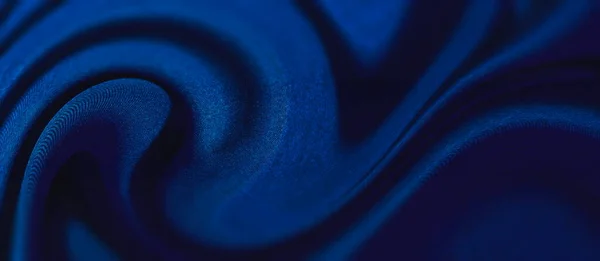 Soyut kumaş arka planı. Kumaş katları koyu mavi renk eğilimi 2020. Her amaç için tasarım