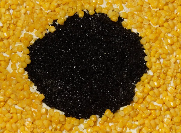 New year holiday salad sunflower flower shaped ingredients chips black caviar corn mushrooms breast poultry chicken close-up — Stock Image New Year Holiday Salad Sunflower Flower Shaped Ingredients Chips Black Royalty Free Stock Photos