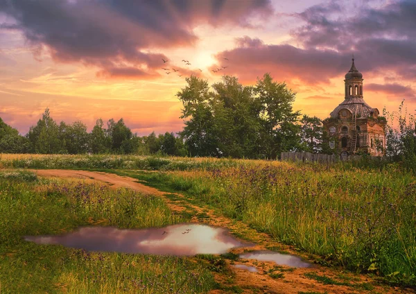 beautiful village landscape summer old church road to the temple Russia