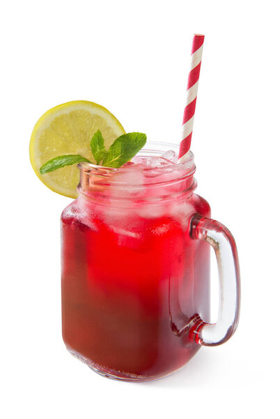 Strawberry, raspberry and cherry lemonade in a glass jar on a white background. 