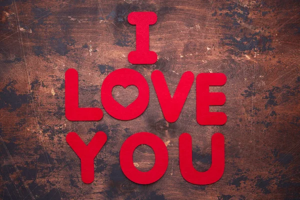 Words Love You Old Wooden Background Red Textile Letters — стоковое фото