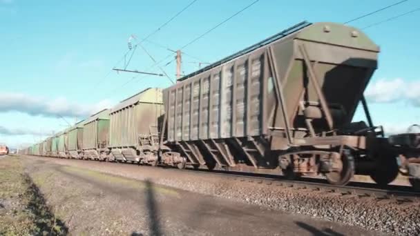 Cargo train on trail. Freight on tracks - Russian Railway. Transportation and delivery of cargo. Vologda, Russia - October 24, 2020 — Stockvideo