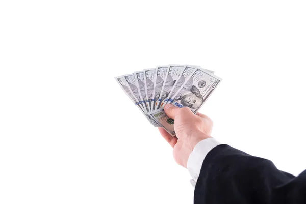 Man's hand in suit with dollars on a white background. — Stock Photo, Image