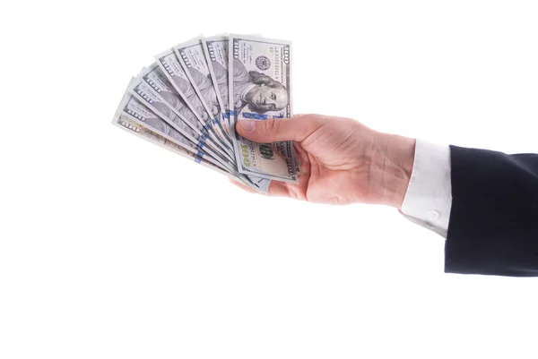 The stretched hand of businessman with cash. — Stock Photo, Image