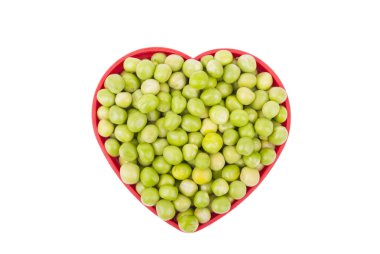 Beyaz bir arka plan üzerinde izole yeşil bezelye ile plaka.