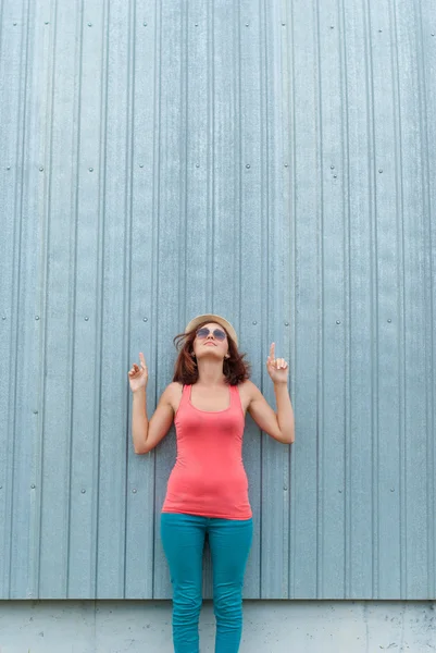 Portrait of beautiful girl with stylish looking up in sunglasses — Stock Photo, Image