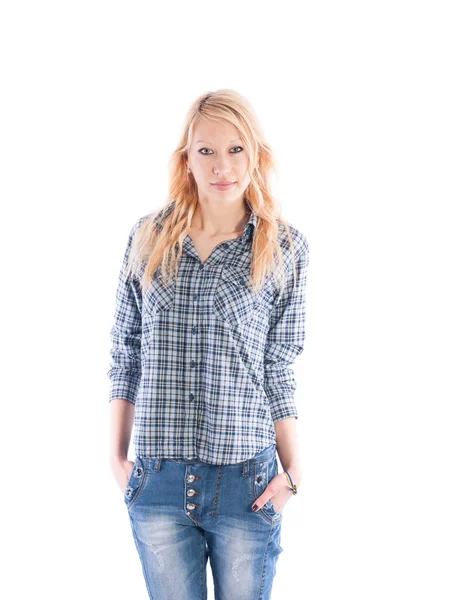 Beautiful girl in a plaid shirt and jeans — Stock Photo, Image