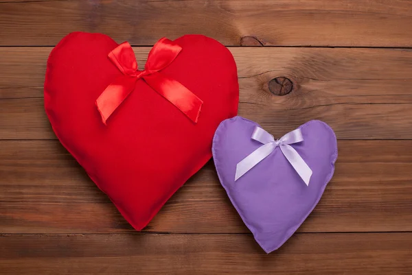 Two hearts on a wooden background. — Stock Photo, Image