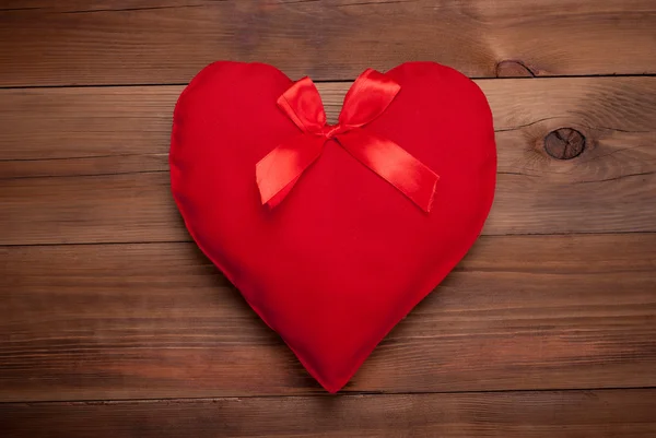 Red heart with a bow — Stock Photo, Image