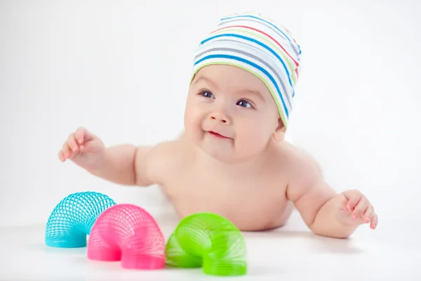 Enfant heureux jouer avec des jouets Photo De Stock