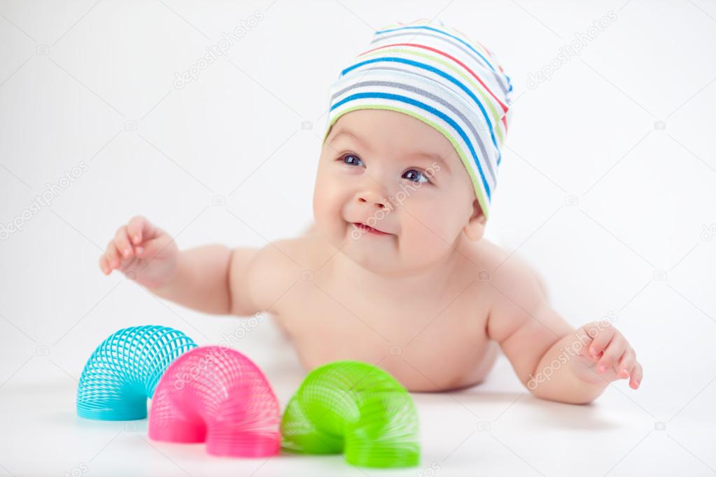 Happy kid playing with toys