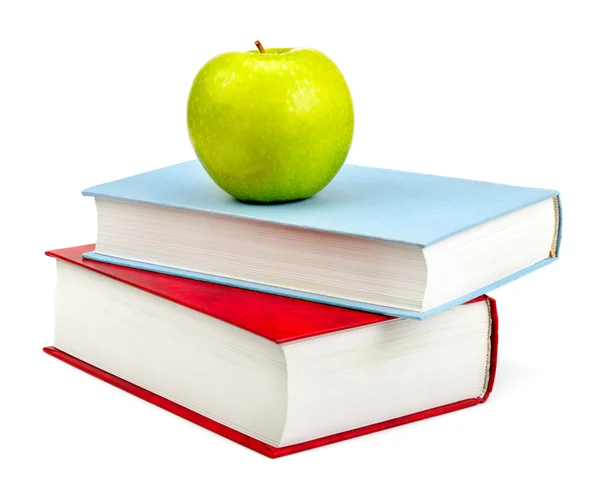 Βιβλία και μήλο που απομονώνονται σε λευκό φόντο — Φωτογραφία Αρχείου