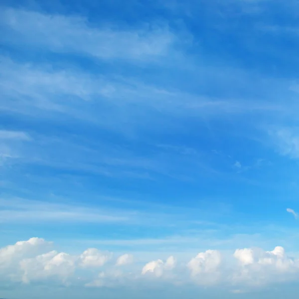 white clouds on the blue sky perfect for the background