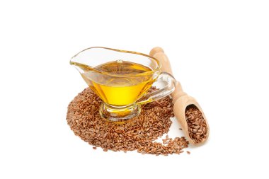 Beyaz arka planda keten tohumu ve yağ izole edilmiş. Konsept - sağlıklı organik gıda.