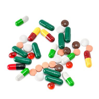 Beyaz arka plan üzerinde izole hapları kümesi