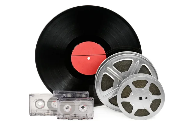 Audio cassettes, records and film strip isolated on white backgr — Stock Photo, Image