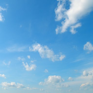 light cumulus clouds in the blue sky clipart