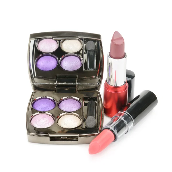 Lipsticks and eye shadow — Stock Photo, Image