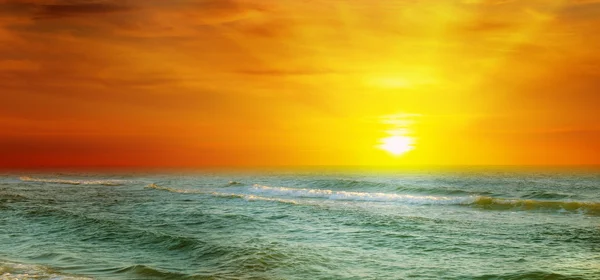Fantastic sunrise on the ocean Stock Photo