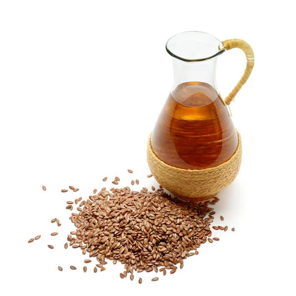 Flax seeds and oil isolated on white background — Stock Photo, Image