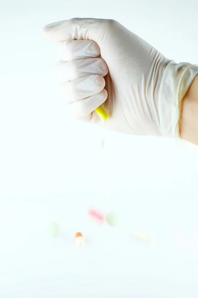 A variety of tablets in the hands — Stock Photo, Image