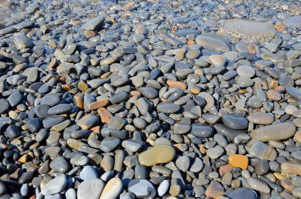 Морские камни, вода — стоковое фото