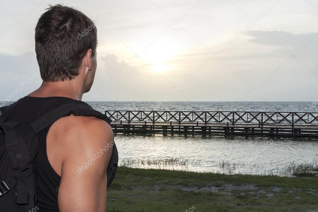 Hiker observing sunrise