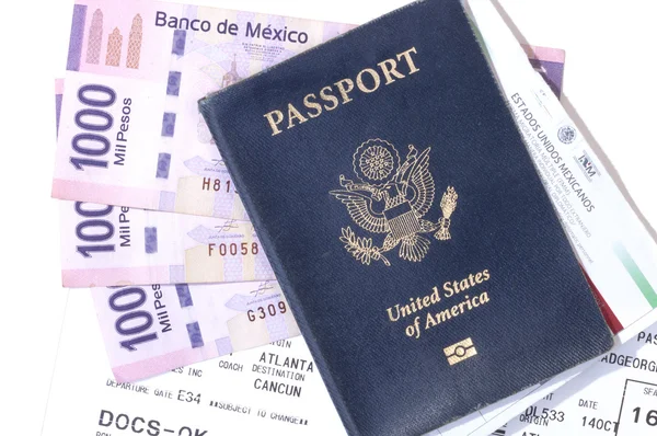 Travel documents and pesos — Stock Photo, Image