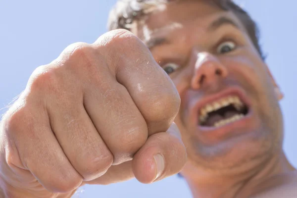 Angry flying fist — Stock Photo, Image