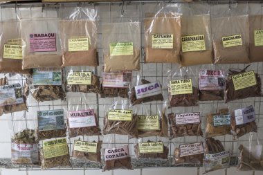 Assortment of packaged herbs in Brazilian market