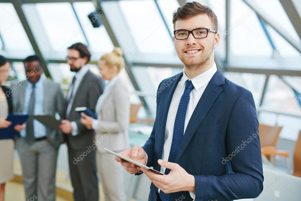 business leader with touchpad