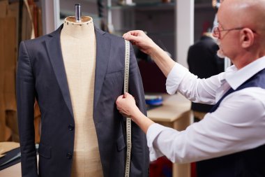 tailor taking measures clipart